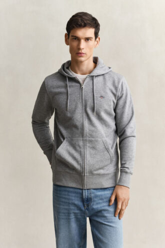 Hoodie med dragkedja och sköld