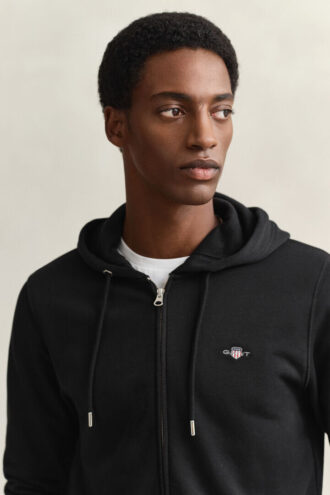 Hoodie med dragkedja och sköld