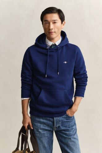 Hoodie med sköldmotiv