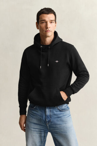 Hoodie med sköldmotiv