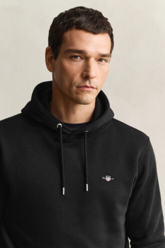 Hoodie med sköldmotiv