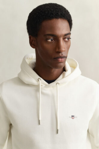 Hoodie med sköldmotiv