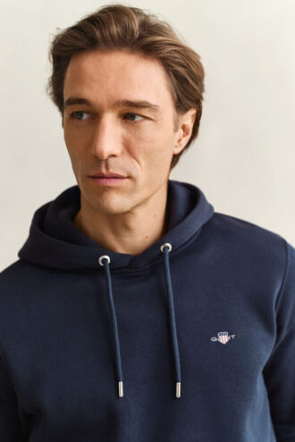 Hoodie med sköldmotiv