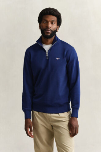 Sweatshirt med halv dragkedja och sköldmotiv