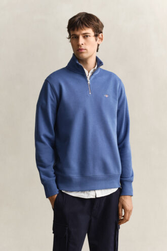 Sweatshirt med halv dragkedja och sköldmotiv
